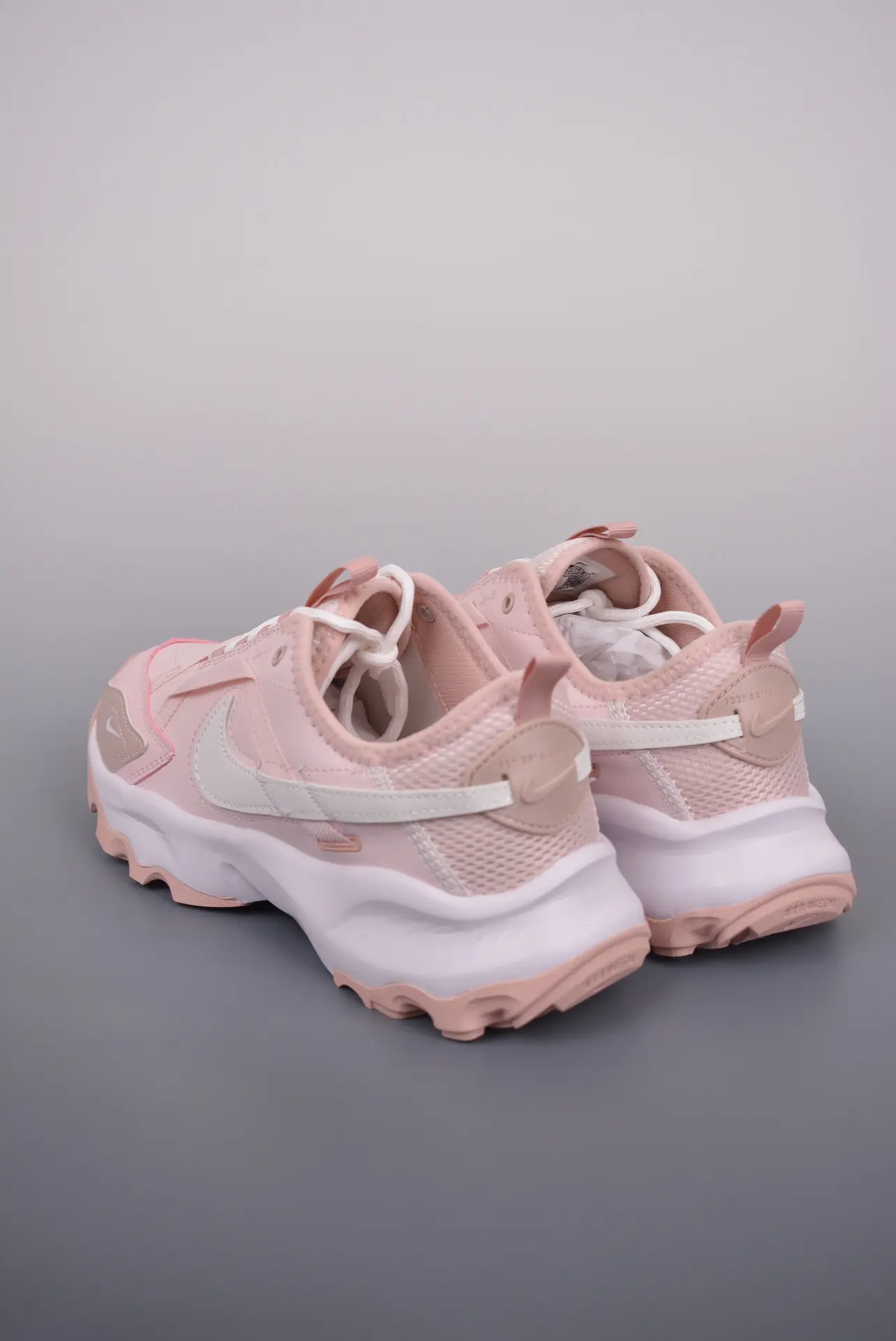 Nike TC 7900 in Pink White: The Perfect Blend of Style and Comfort | YtaYta