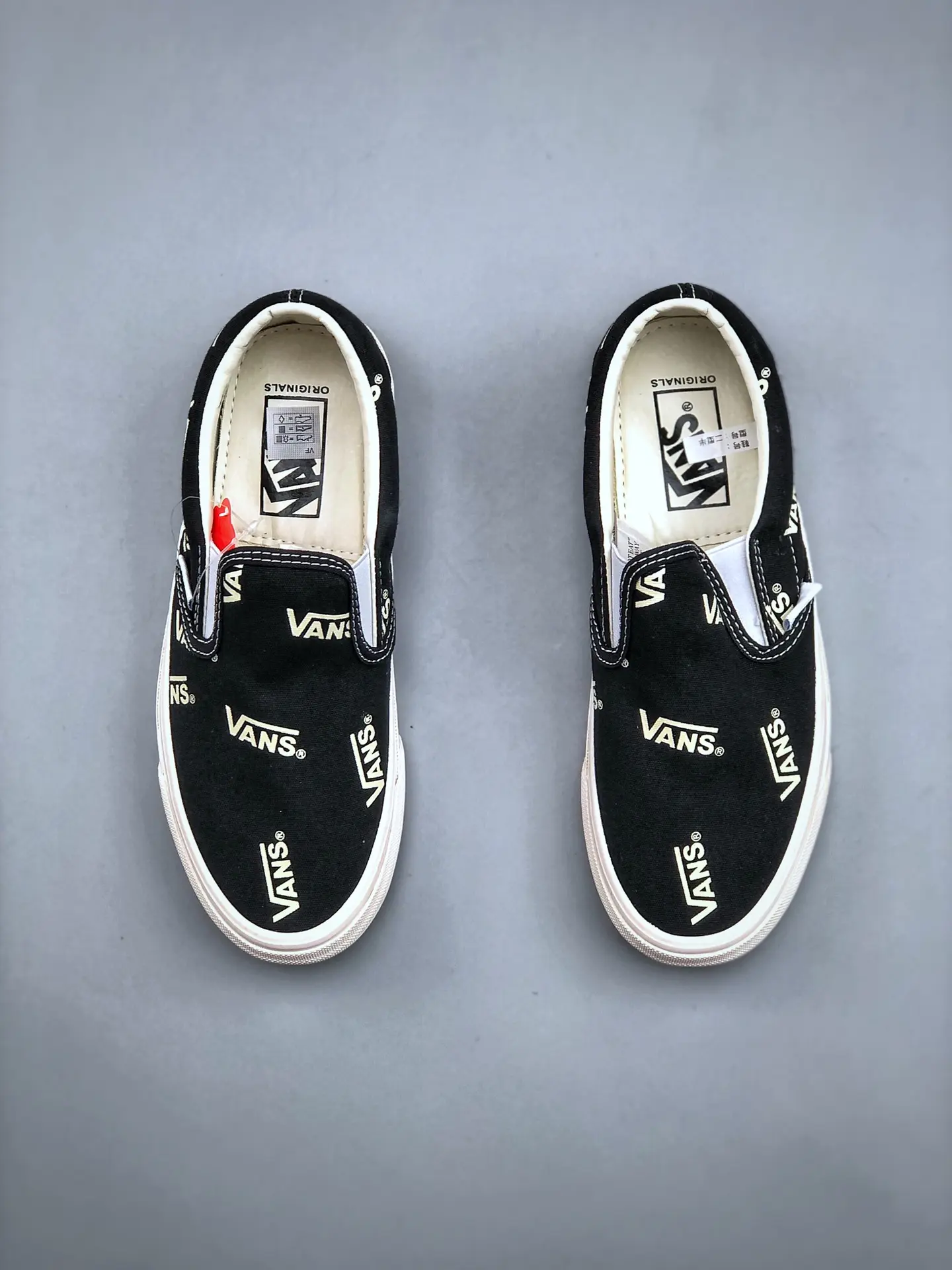 Replica Vans Slip-On Multi-Logo Black: A Comprehensive Review | YtaYta