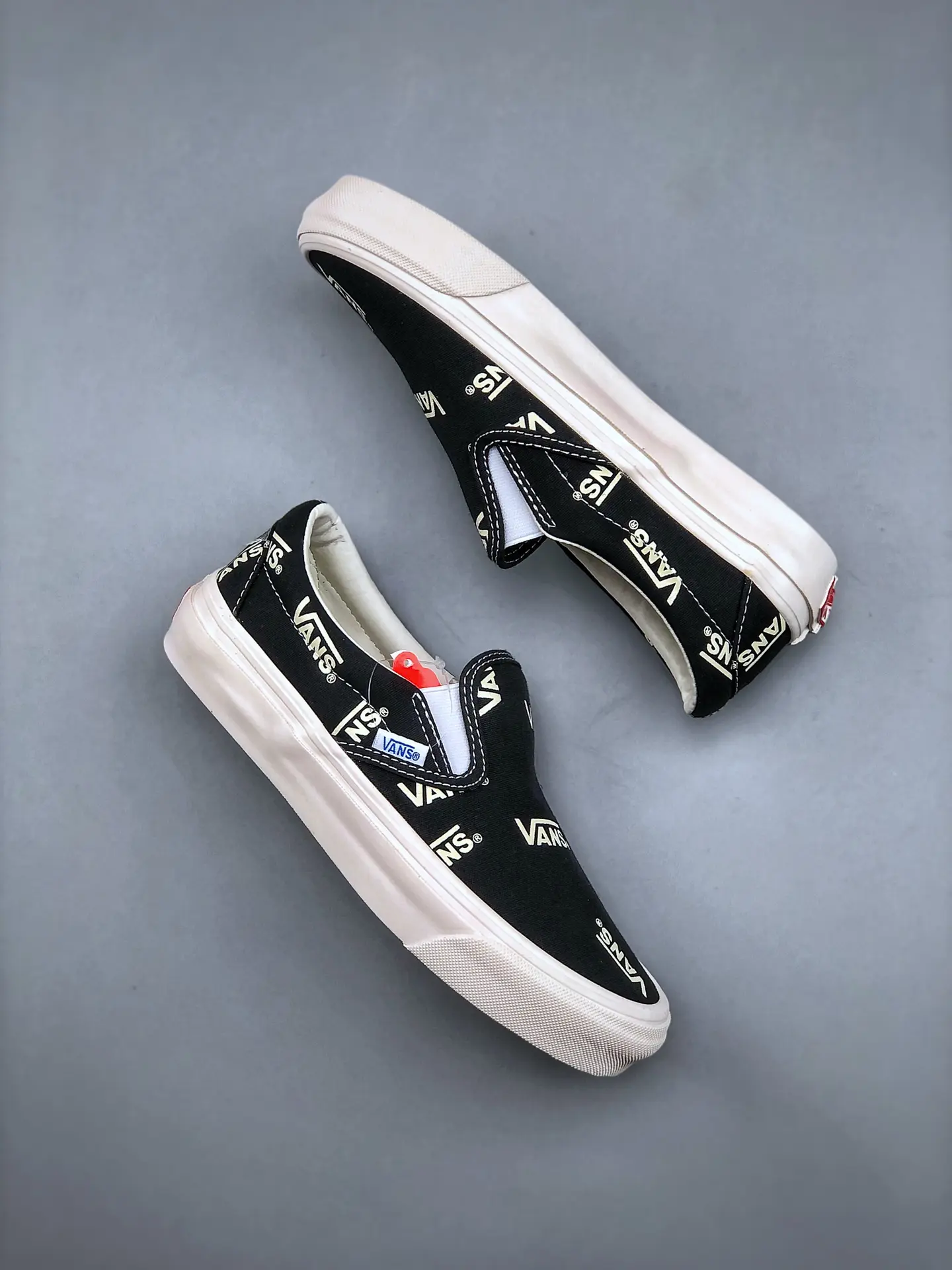 Replica Vans Slip-On Multi-Logo Black: A Comprehensive Review | YtaYta