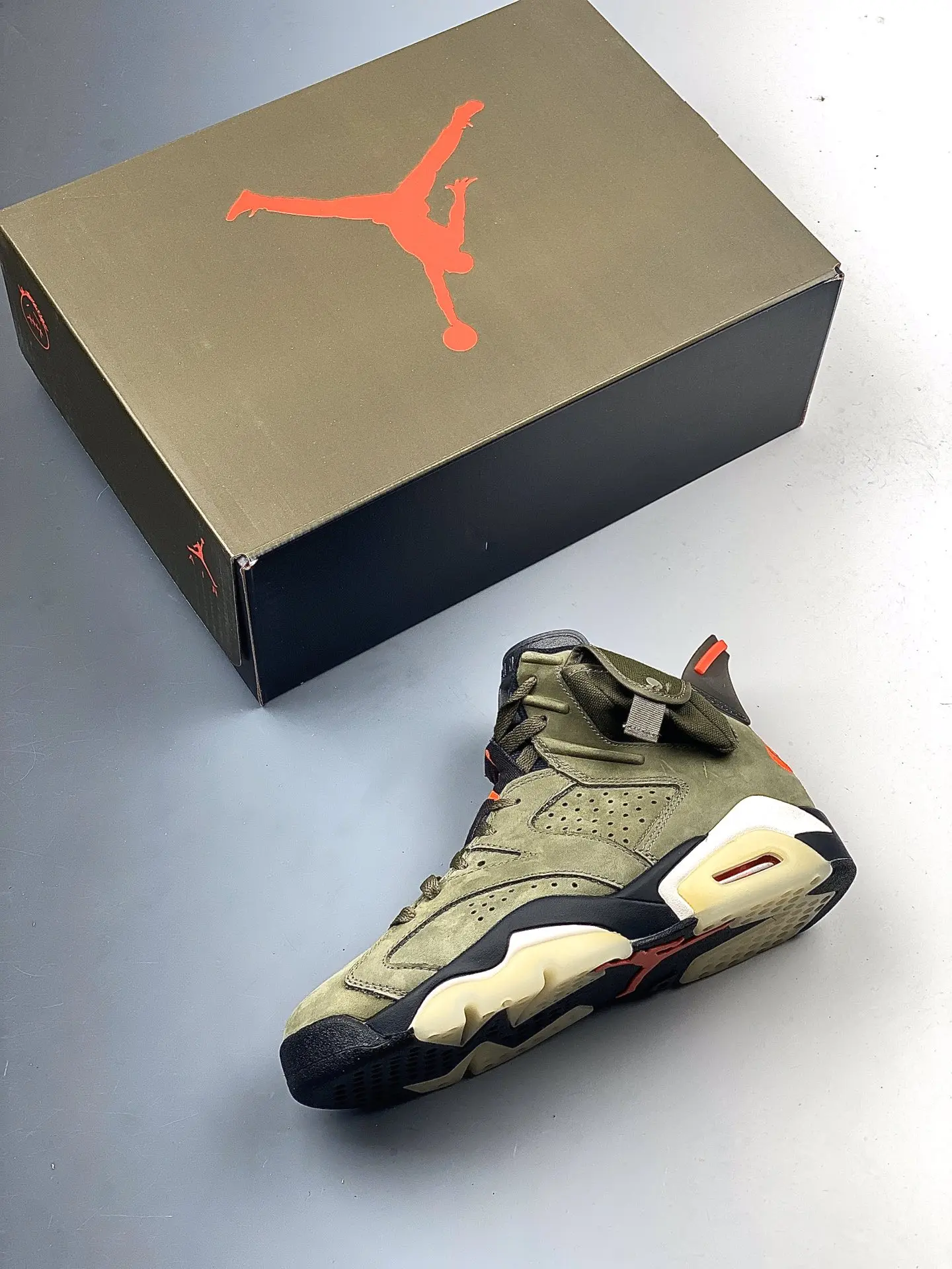 The Hype and Appeal of Travis Scott x Air Jordan 6 Olive Replicas | YtaYta