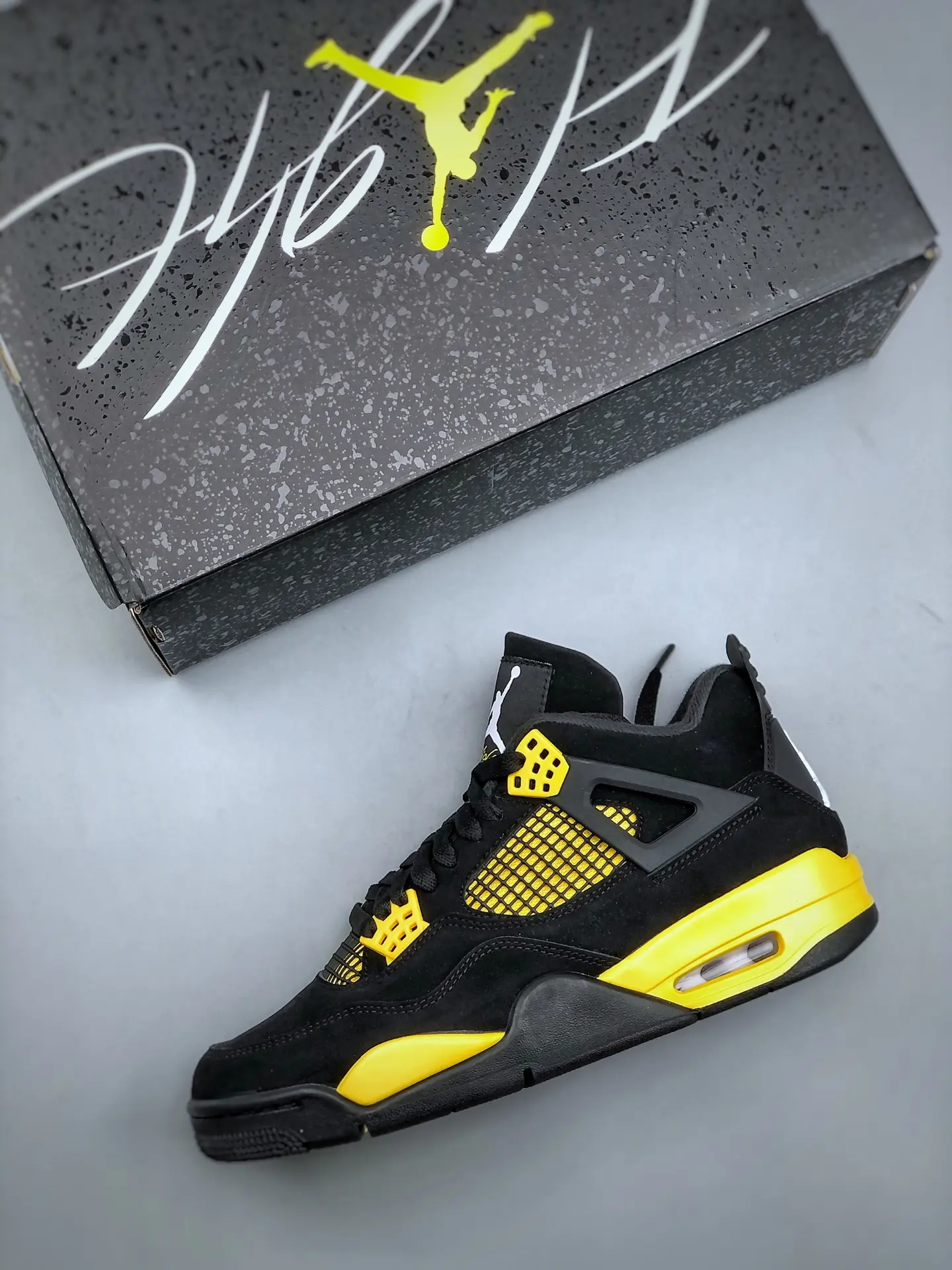 Nike Air Jordan Retro IV 4 Thunder 2023 Black Yellow Men's Size 13 Replica: A Deep Dive into the World of Replicas | YtaYta