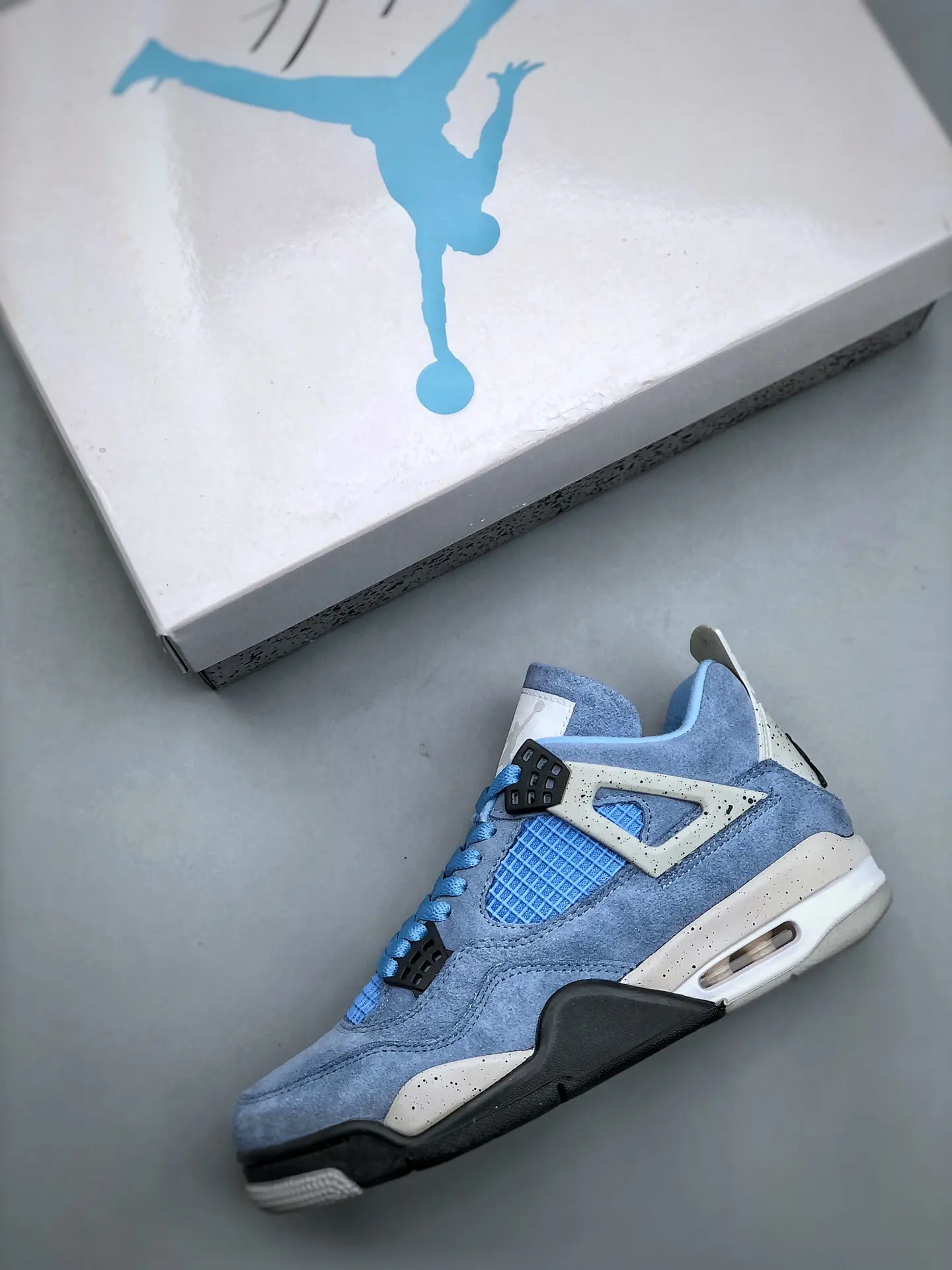 Replica Air Jordan 4 Retro “University Blue” Sneakers for Sale in Los Angeles | YtaYta