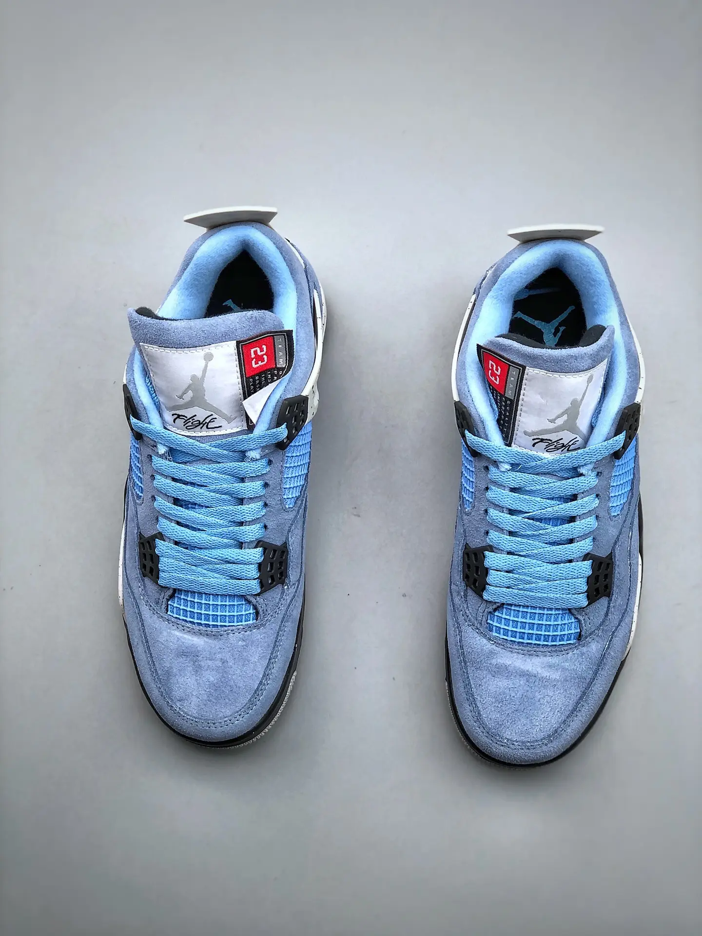 Replica Air Jordan 4 Retro “University Blue” Sneakers for Sale in Los Angeles | YtaYta