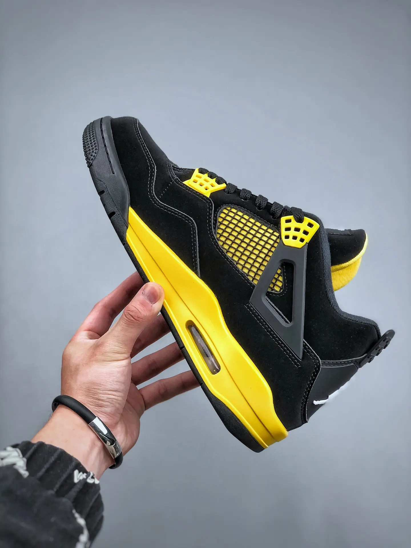 The Ultimate Guide to the Replica Air Jordan 4 Retro Thunder 2023 | YtaYta