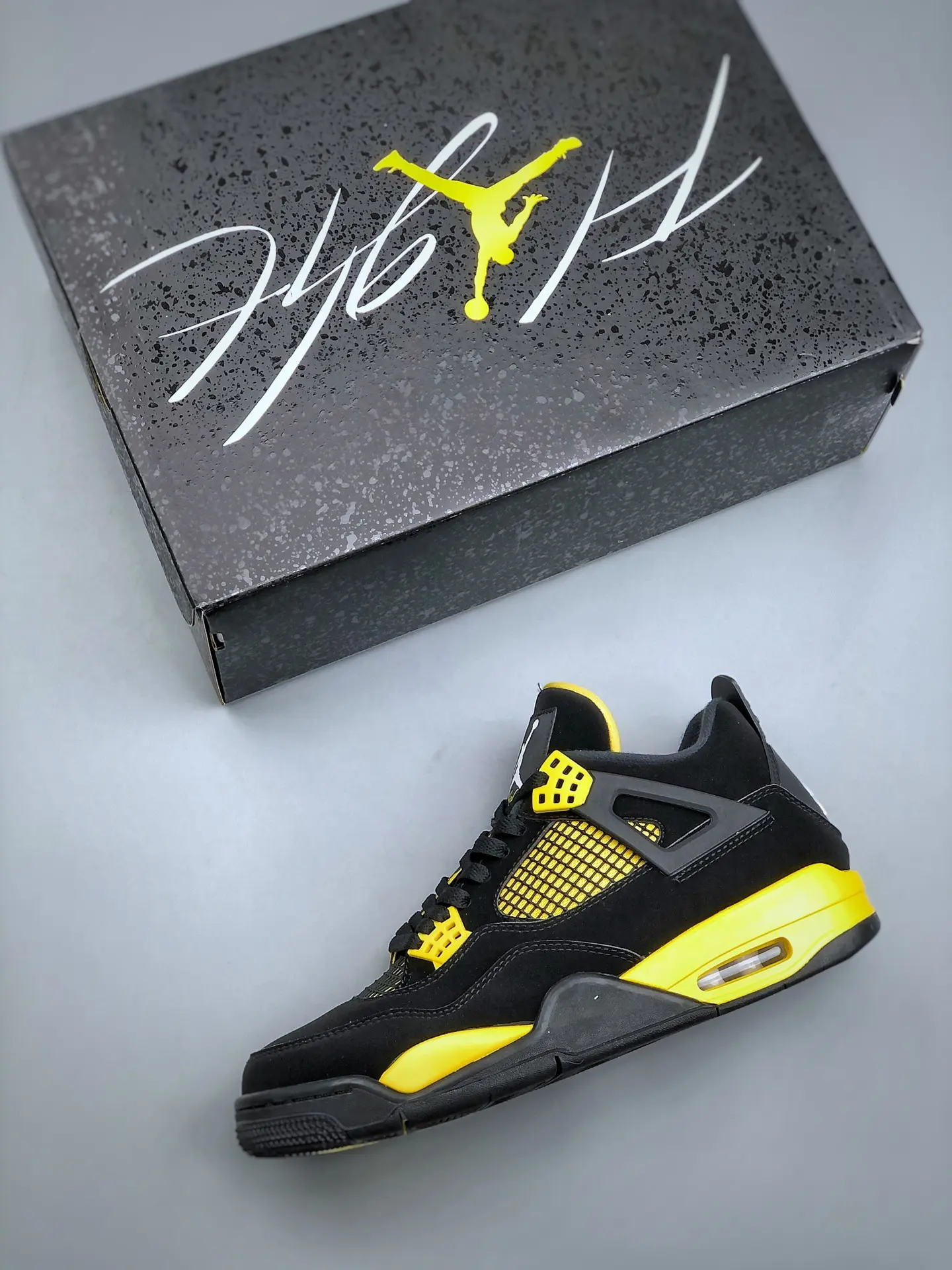 The Ultimate Guide to the Replica Air Jordan 4 Retro Thunder 2023 | YtaYta