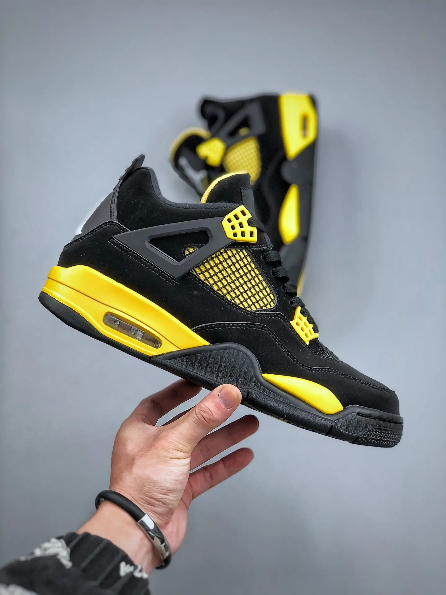 The Ultimate Guide to the Replica Air Jordan 4 Retro Thunder 2023 - YtaYta