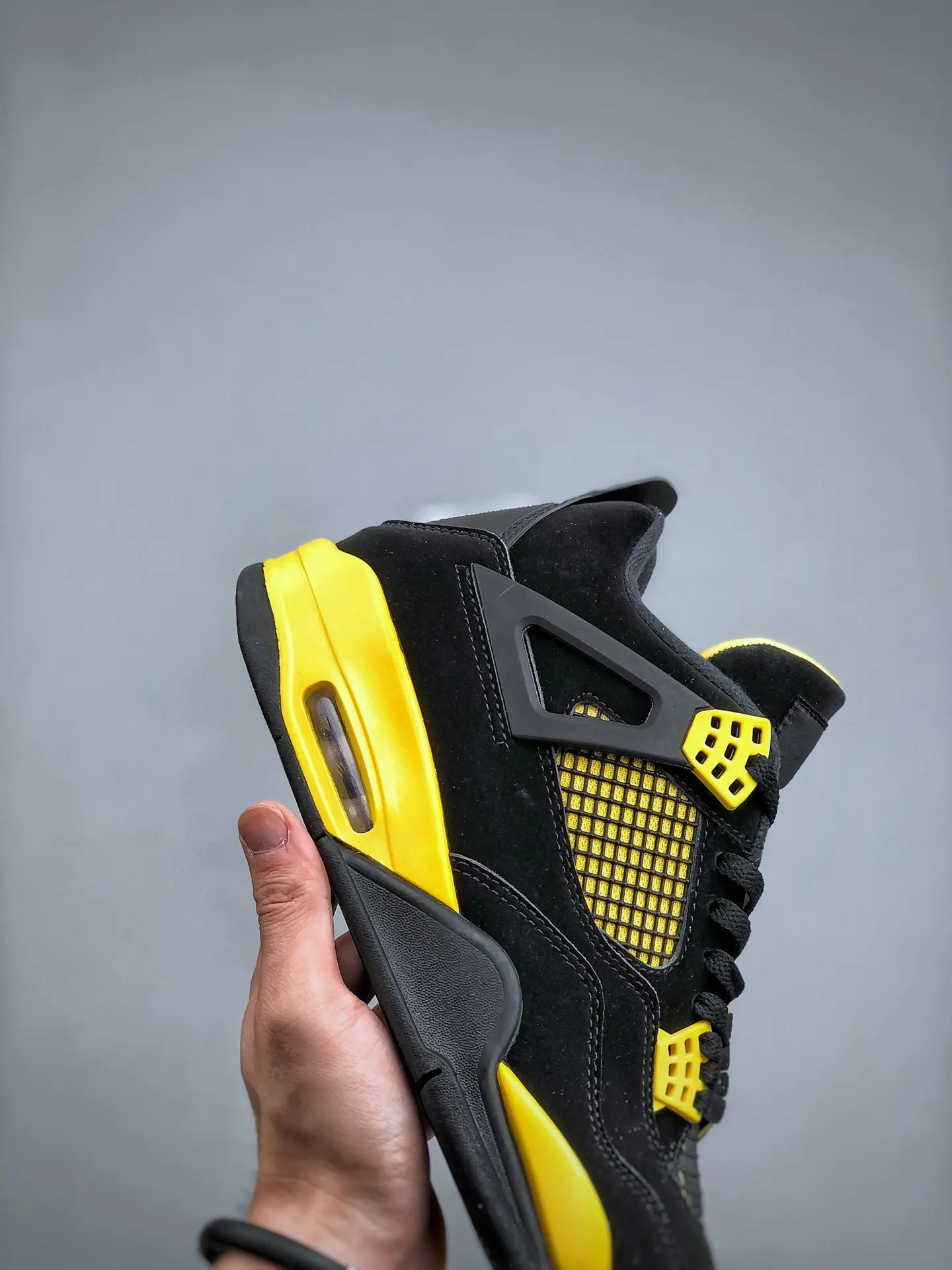 The Ultimate Guide to the Replica Air Jordan 4 Retro Thunder 2023 | YtaYta