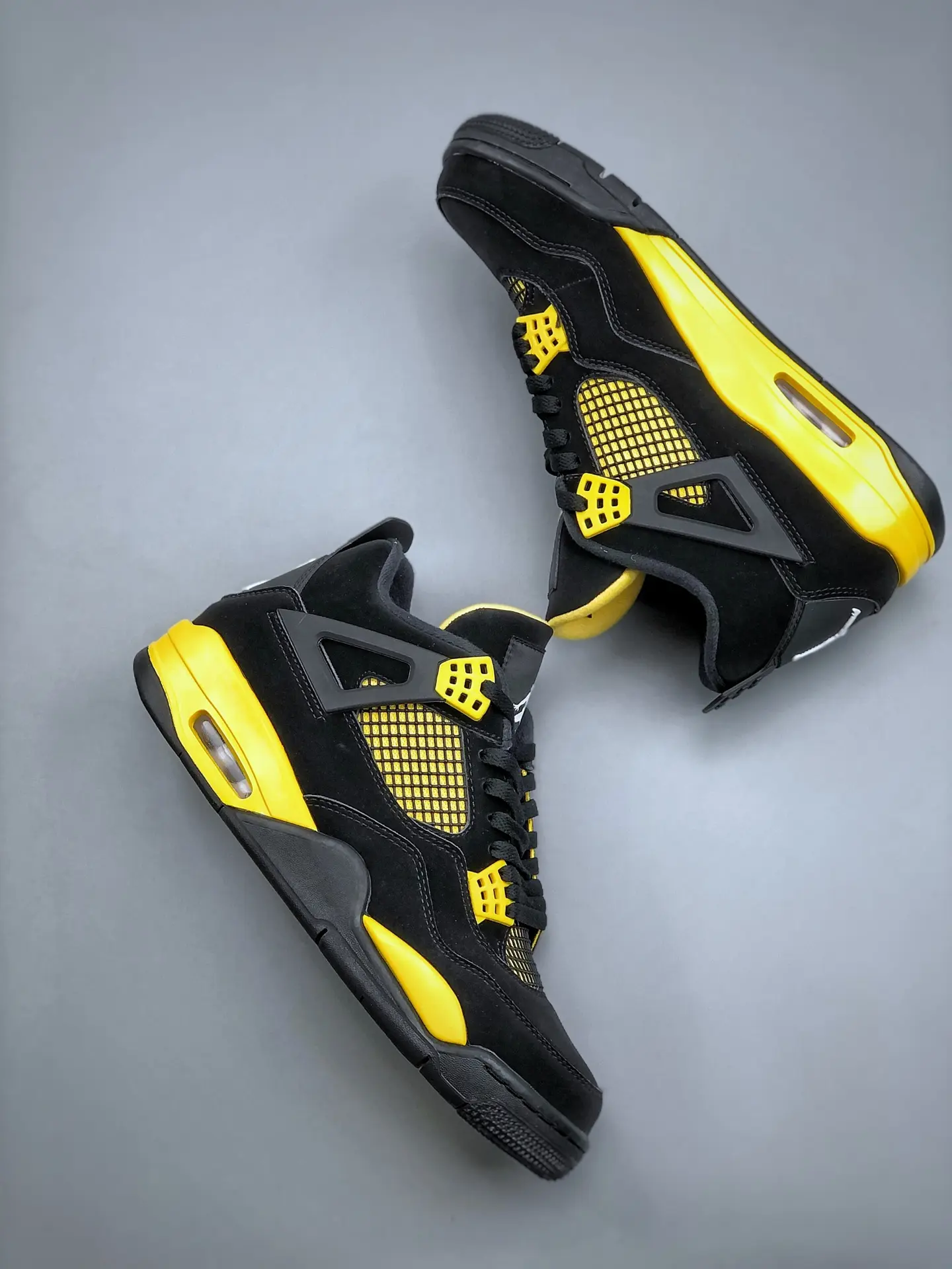 The Ultimate Guide to the Replica Air Jordan 4 Retro Thunder 2023 | YtaYta