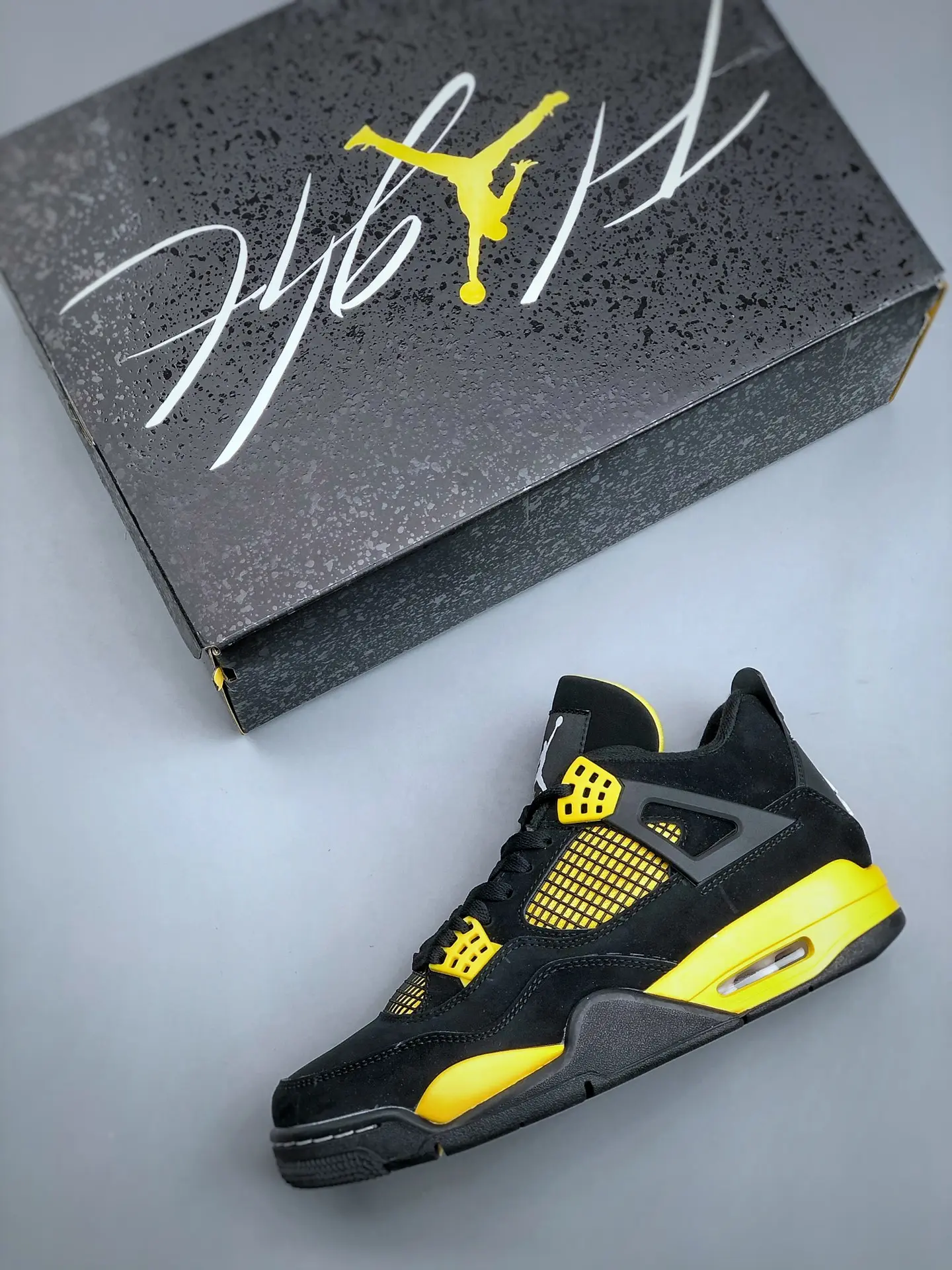 Air Jordan 4 Retro 'Thunder' 2023 - Black/Yellow: Real vs. Replica | YtaYta