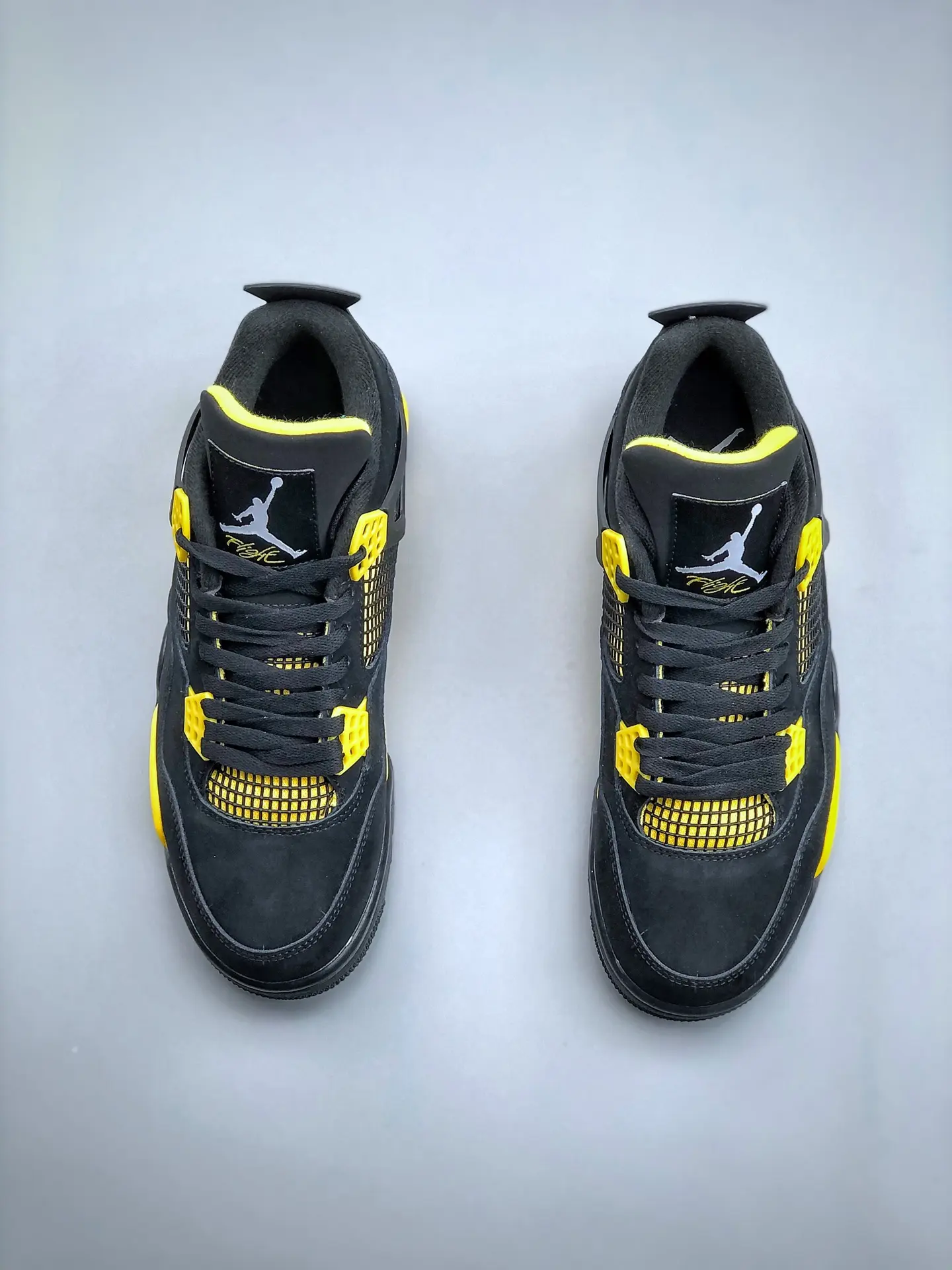 Air Jordan 4 Retro 'Thunder' 2023 - Black/Yellow: Real vs. Replica | YtaYta