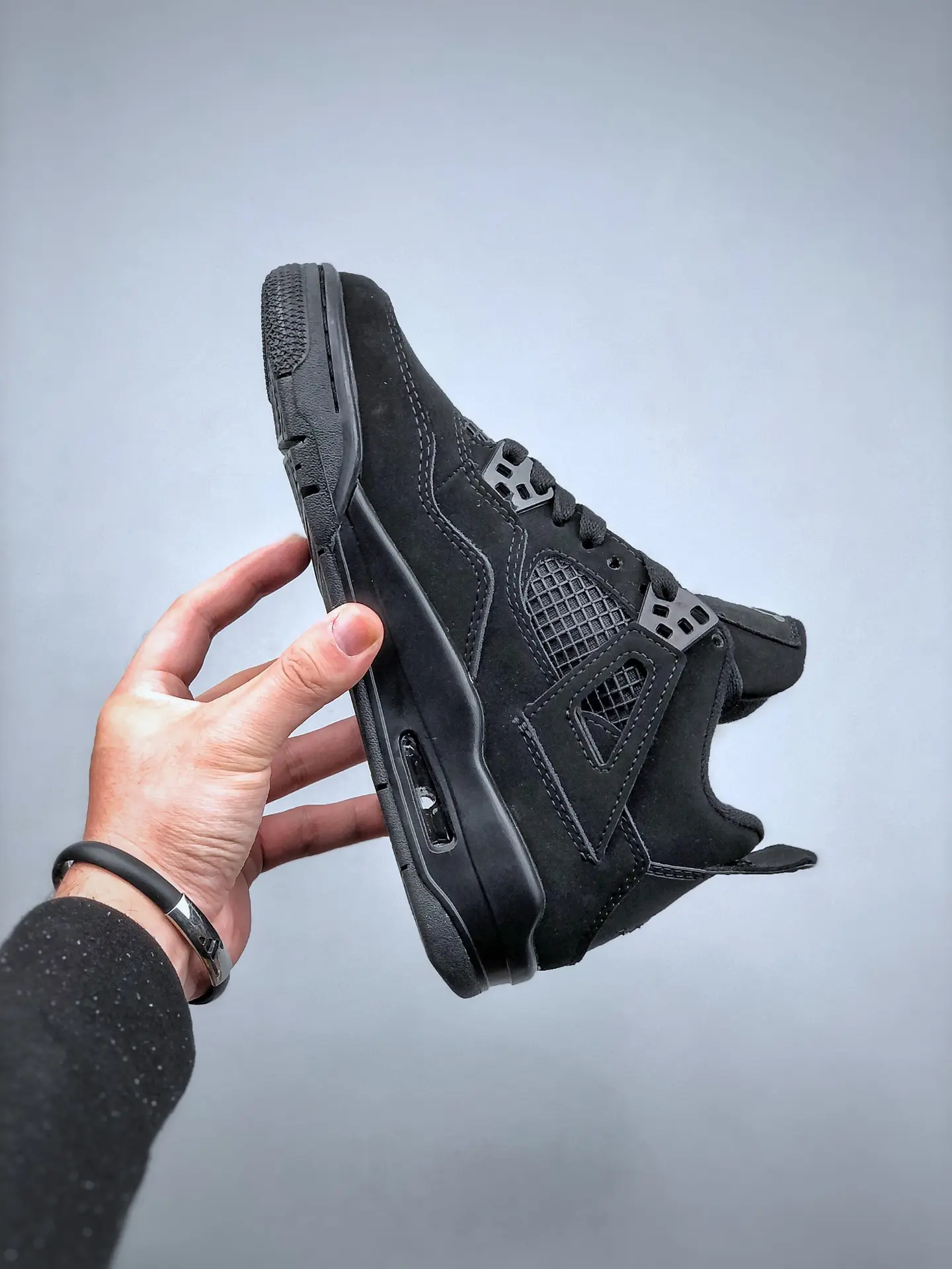 The Iconic Air Jordan 4 'Black Cat' - Authentic vs. Replica | YtaYta