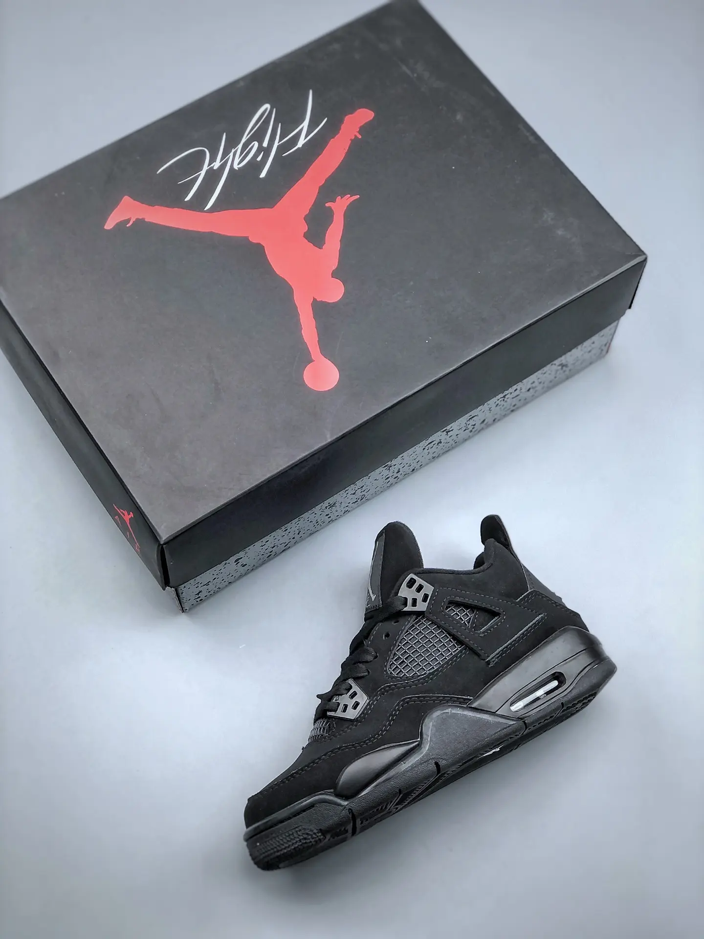 The Iconic Air Jordan 4 'Black Cat' - Authentic vs. Replica | YtaYta