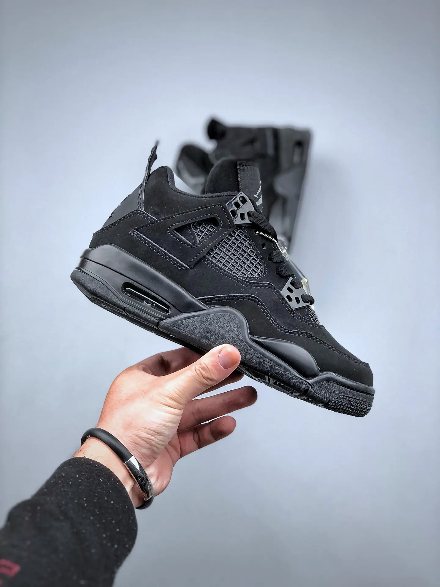 The Iconic Air Jordan 4 'Black Cat' - Authentic vs. Replica | YtaYta