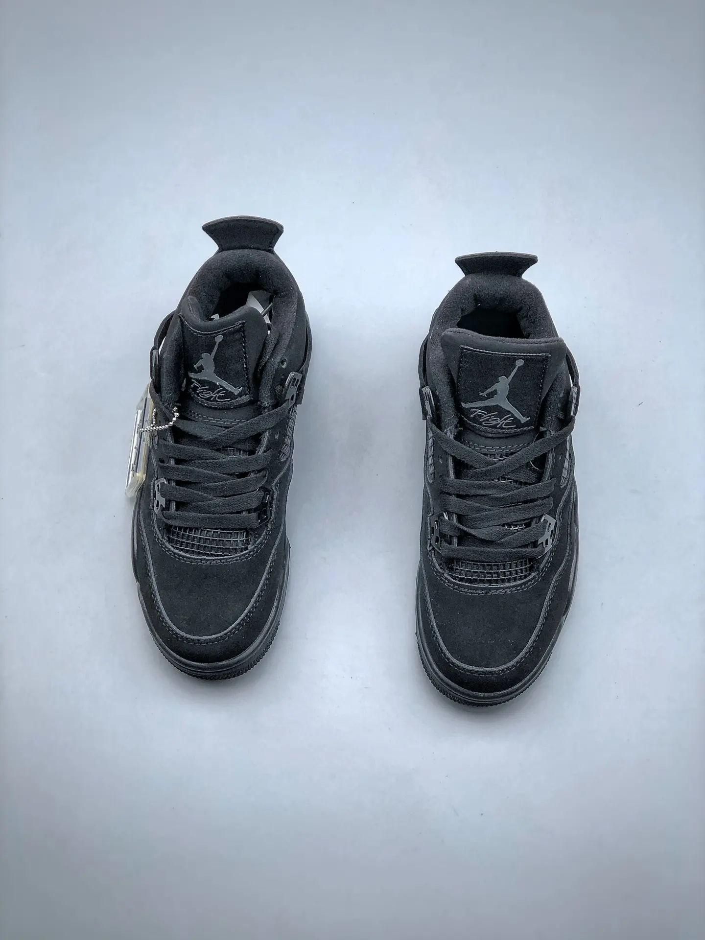 The Iconic Air Jordan 4 'Black Cat' - Authentic vs. Replica | YtaYta