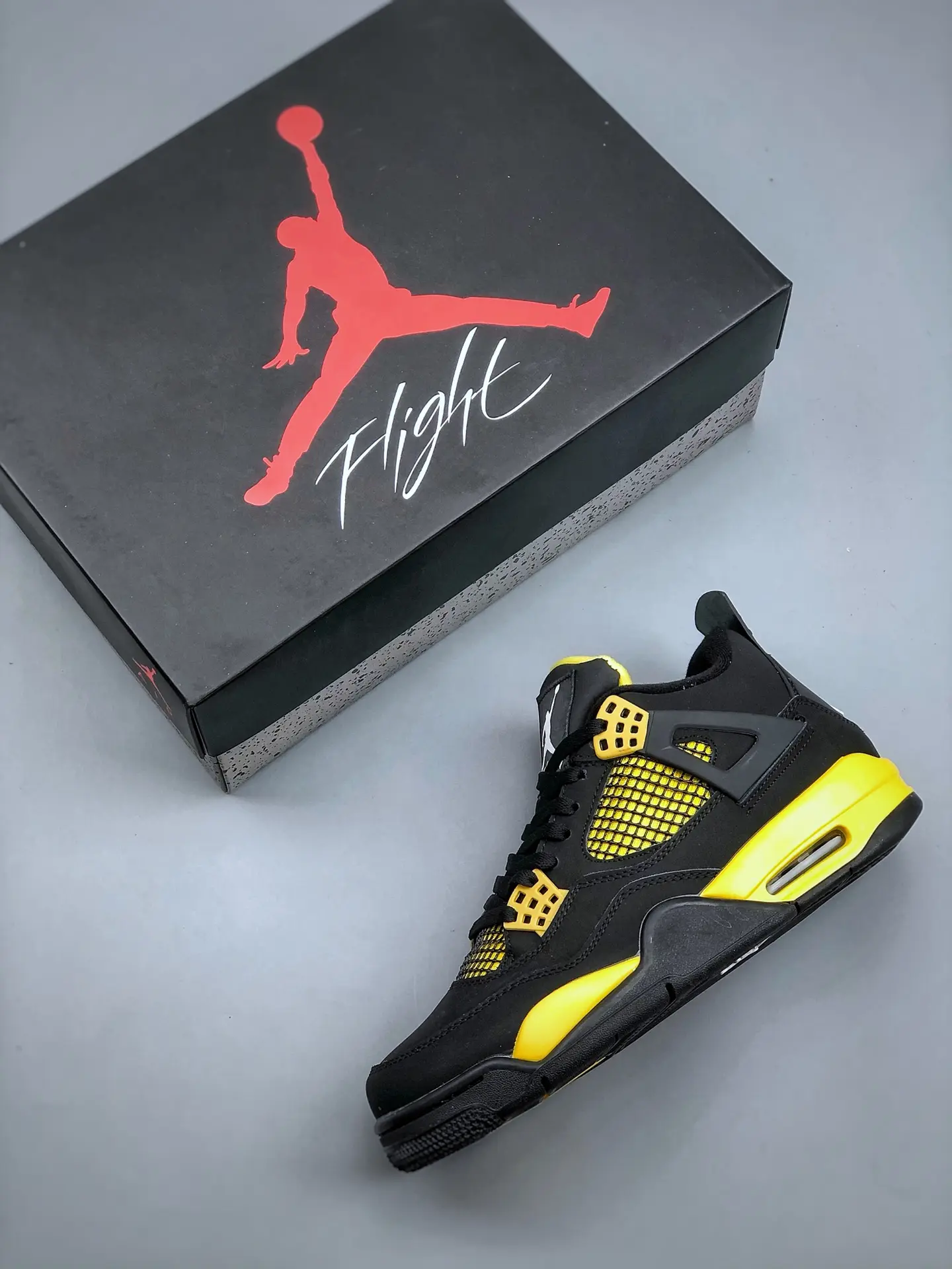 Exploring the Replica Air Jordan 4 Thunder Yellow Black: A Comprehensive Review | YtaYta