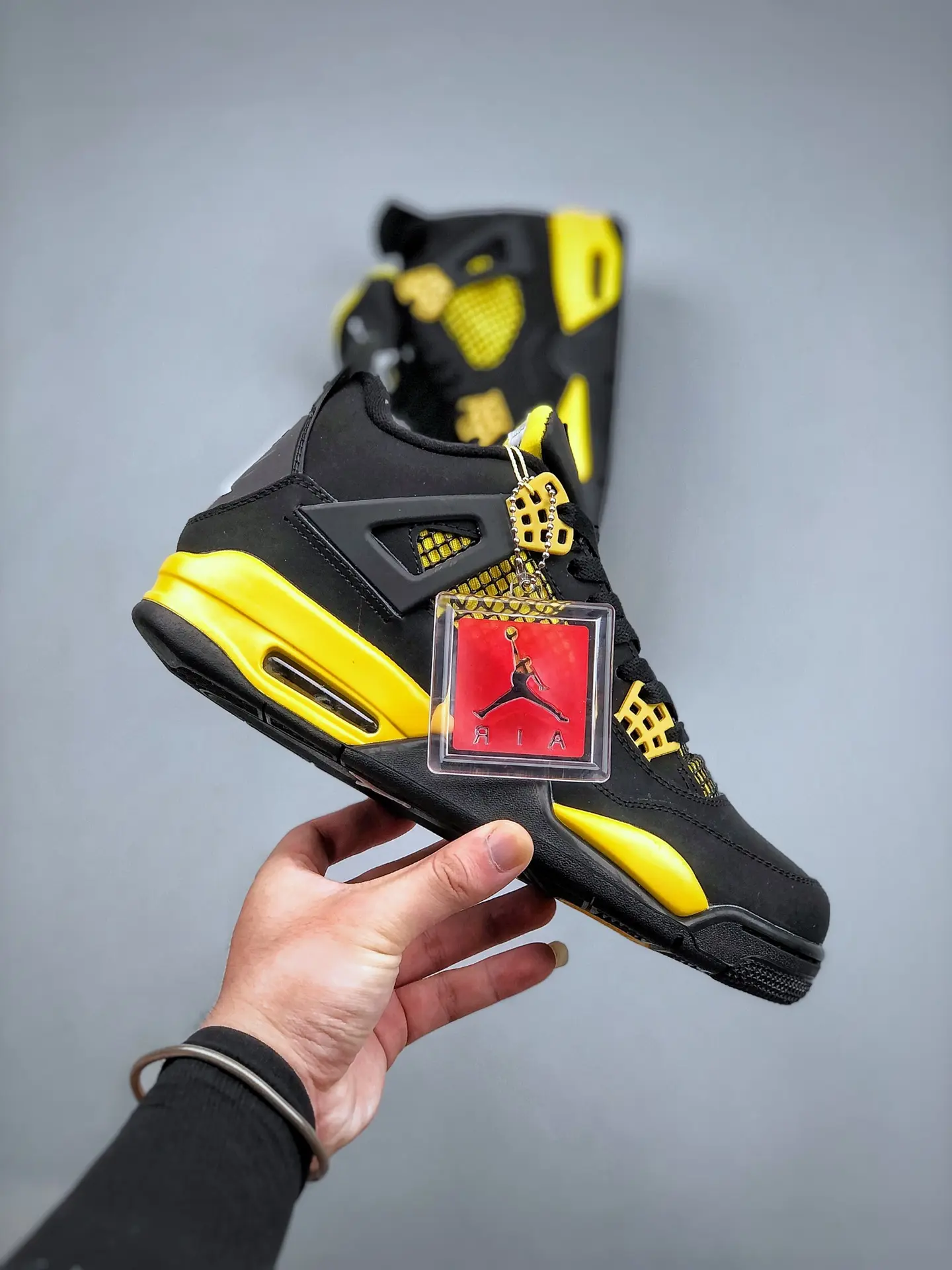 Exploring the Replica Air Jordan 4 Thunder Yellow Black: A Comprehensive Review | YtaYta