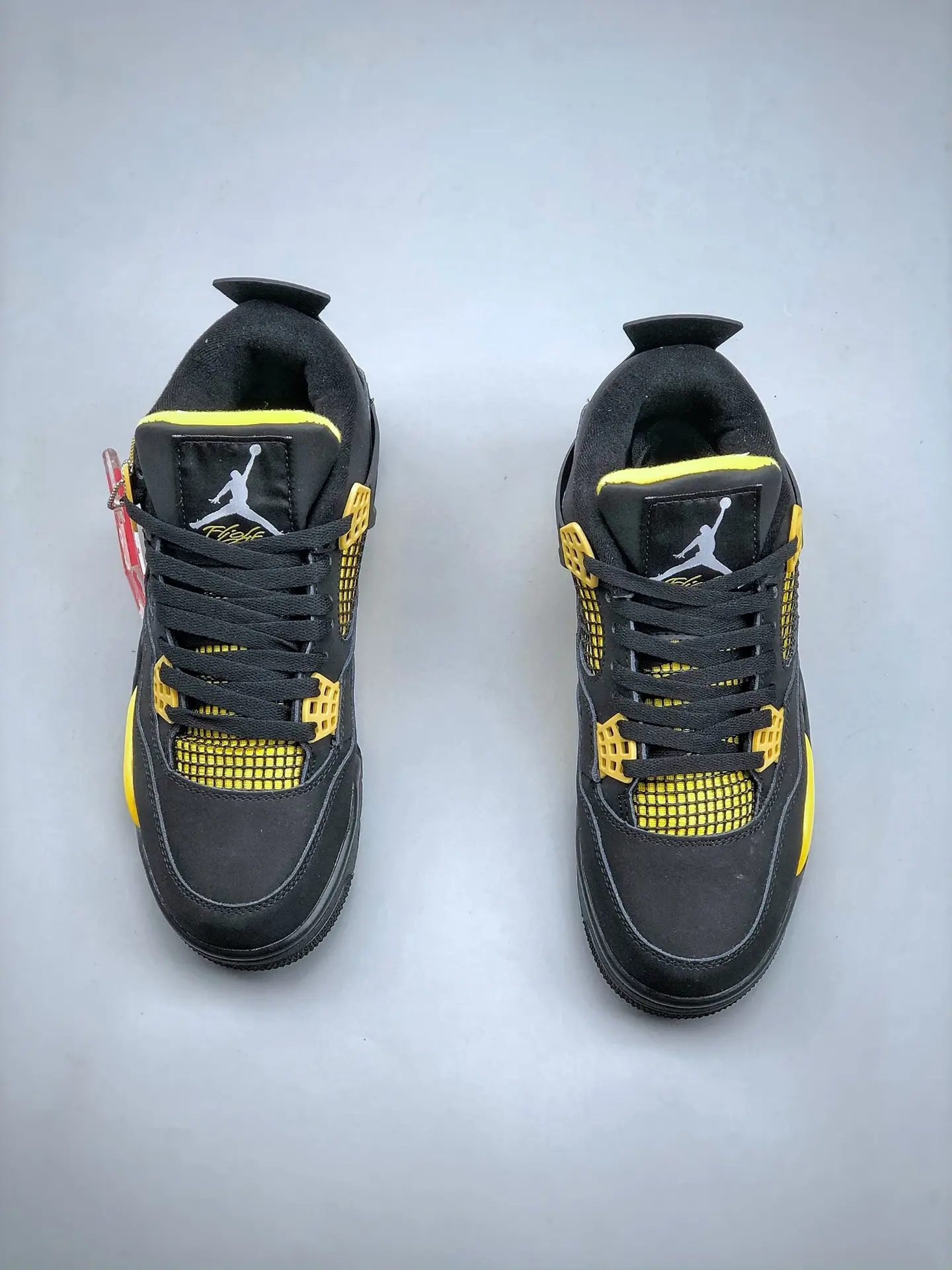 Exploring the Replica Air Jordan 4 Thunder Yellow Black: A Comprehensive Review | YtaYta