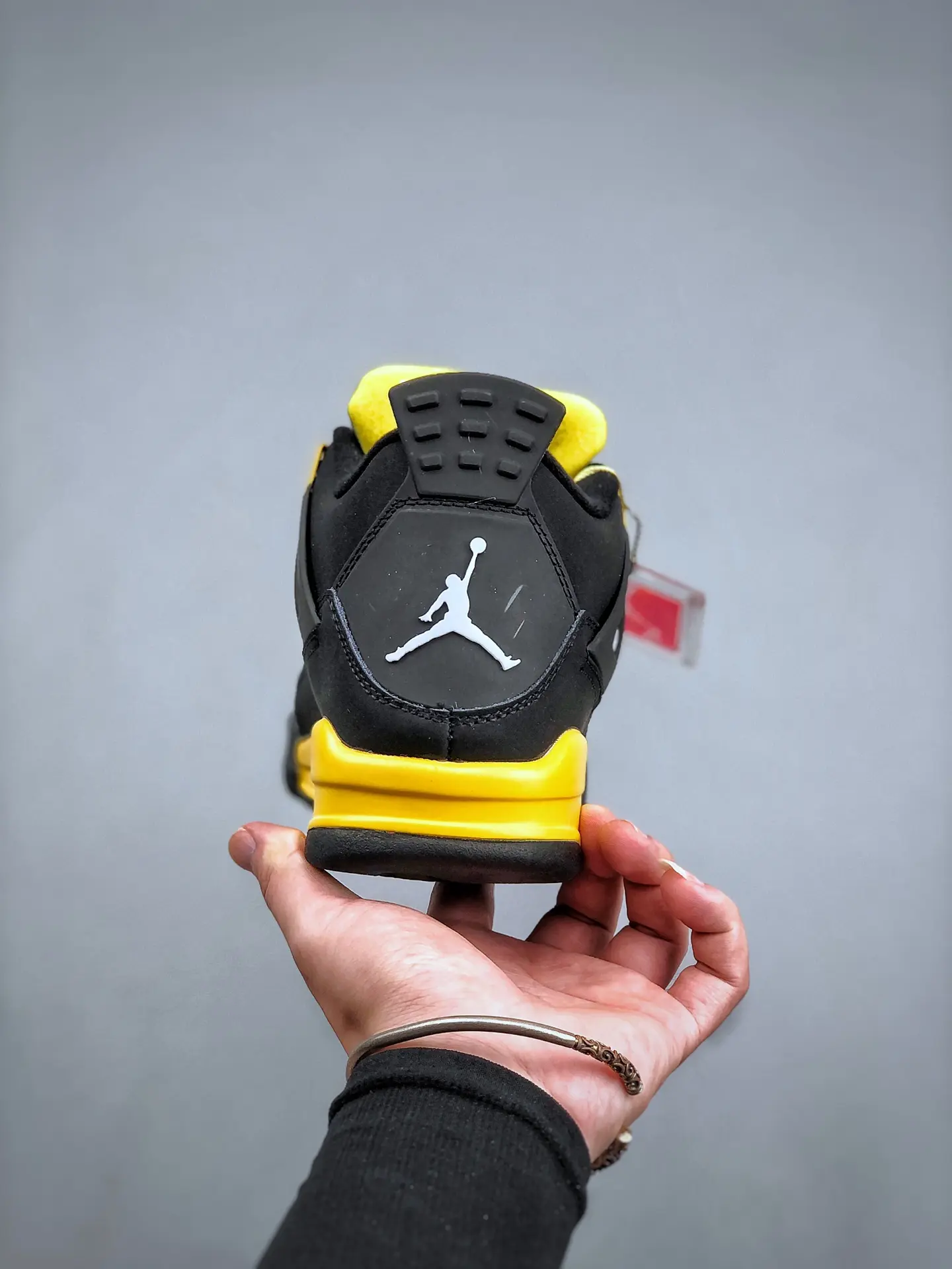 Exploring the Replica Air Jordan 4 Thunder Yellow Black: A Comprehensive Review | YtaYta