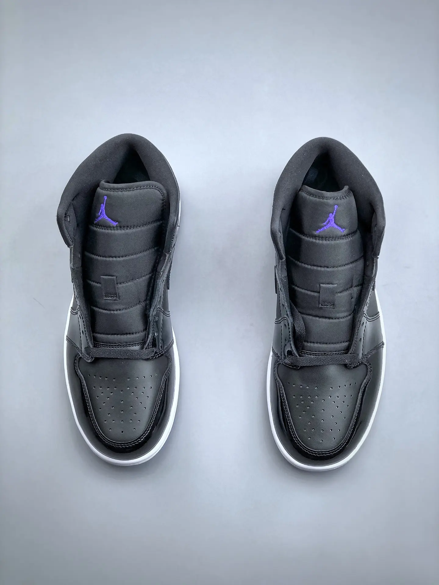 Unveiling the Replica Air Jordan 1 Mid SE 'Space Jam' Black Sneakers | YtaYta