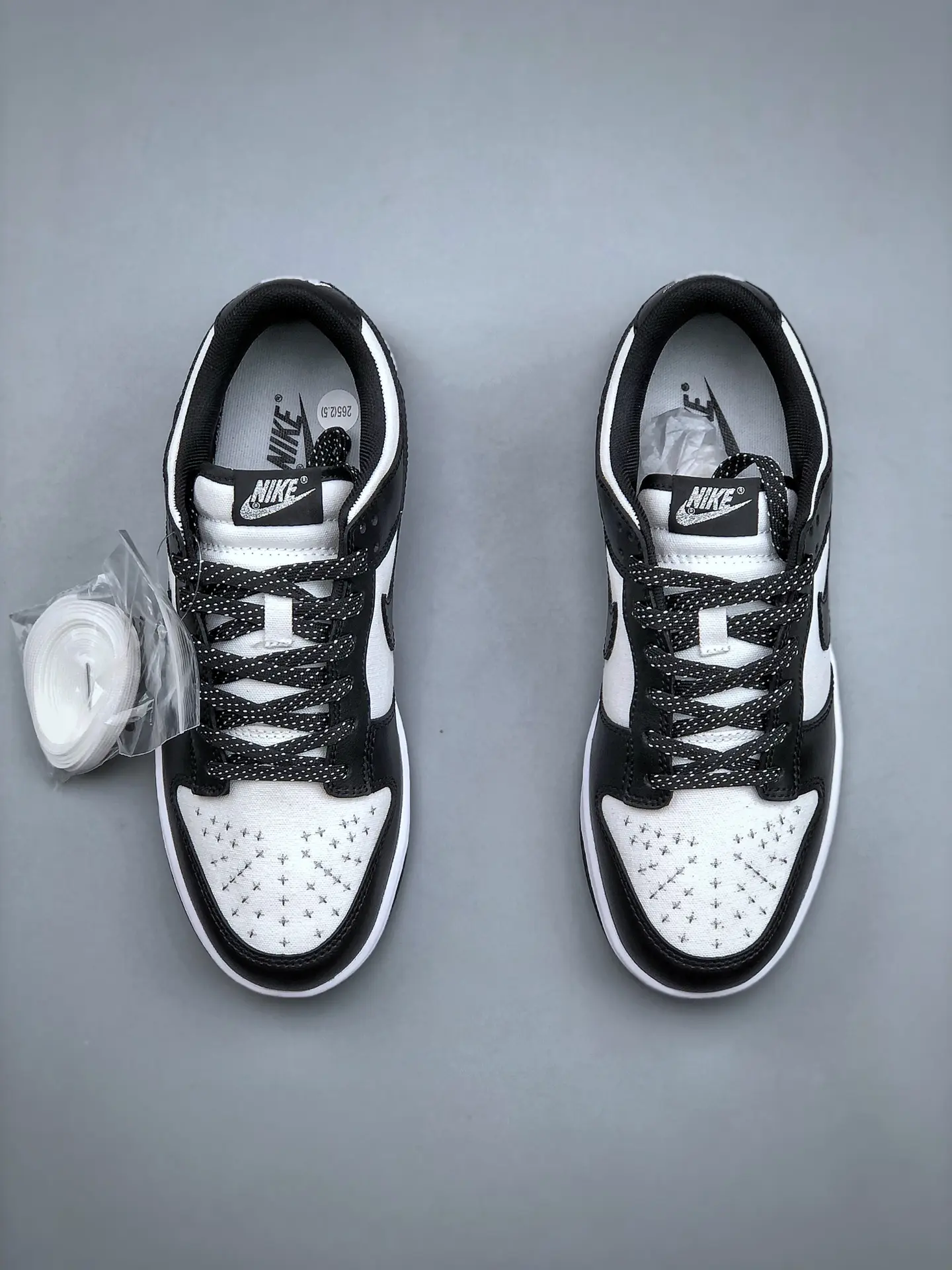 Discover the Allure of Replica Nike Dunk Low Sneakers: Black and White | YtaYta