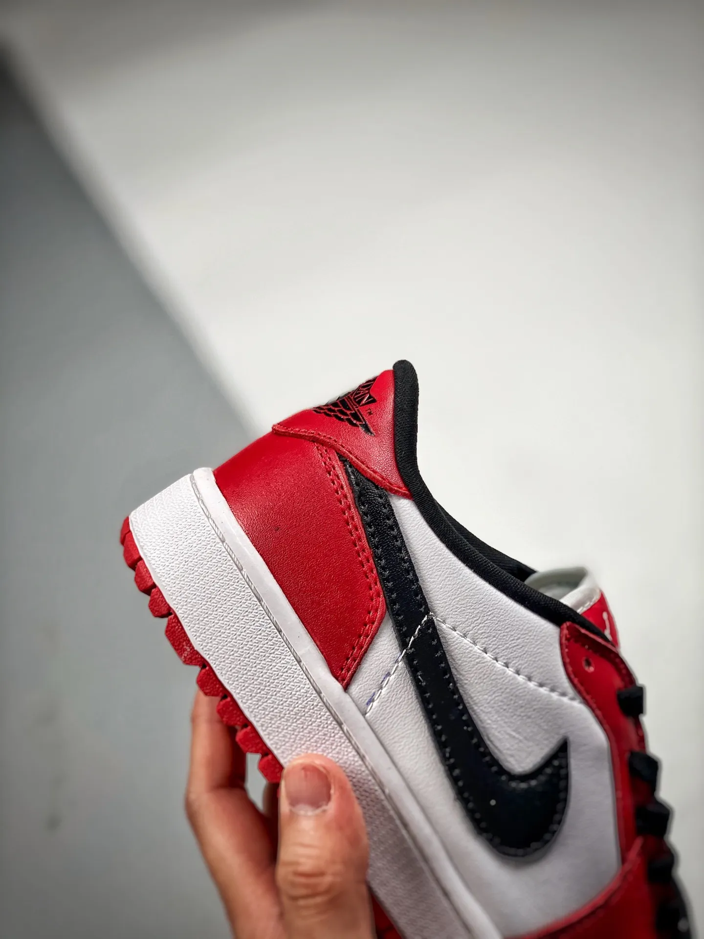 Exploring the Phenomenon of Fake Rep Replica Air Jordan 1 Lows in 'Chicago' Colorway | YtaYta