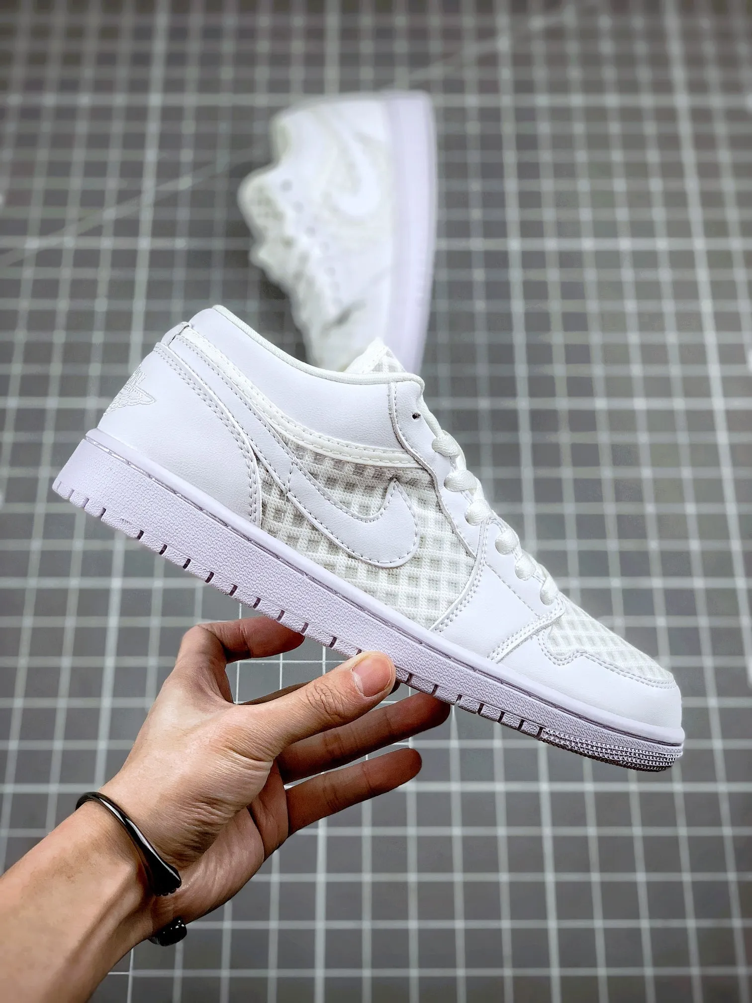 Air Jordan 1 Retro Low Breathe 'Triple White': A Comprehensive Review | YtaYta