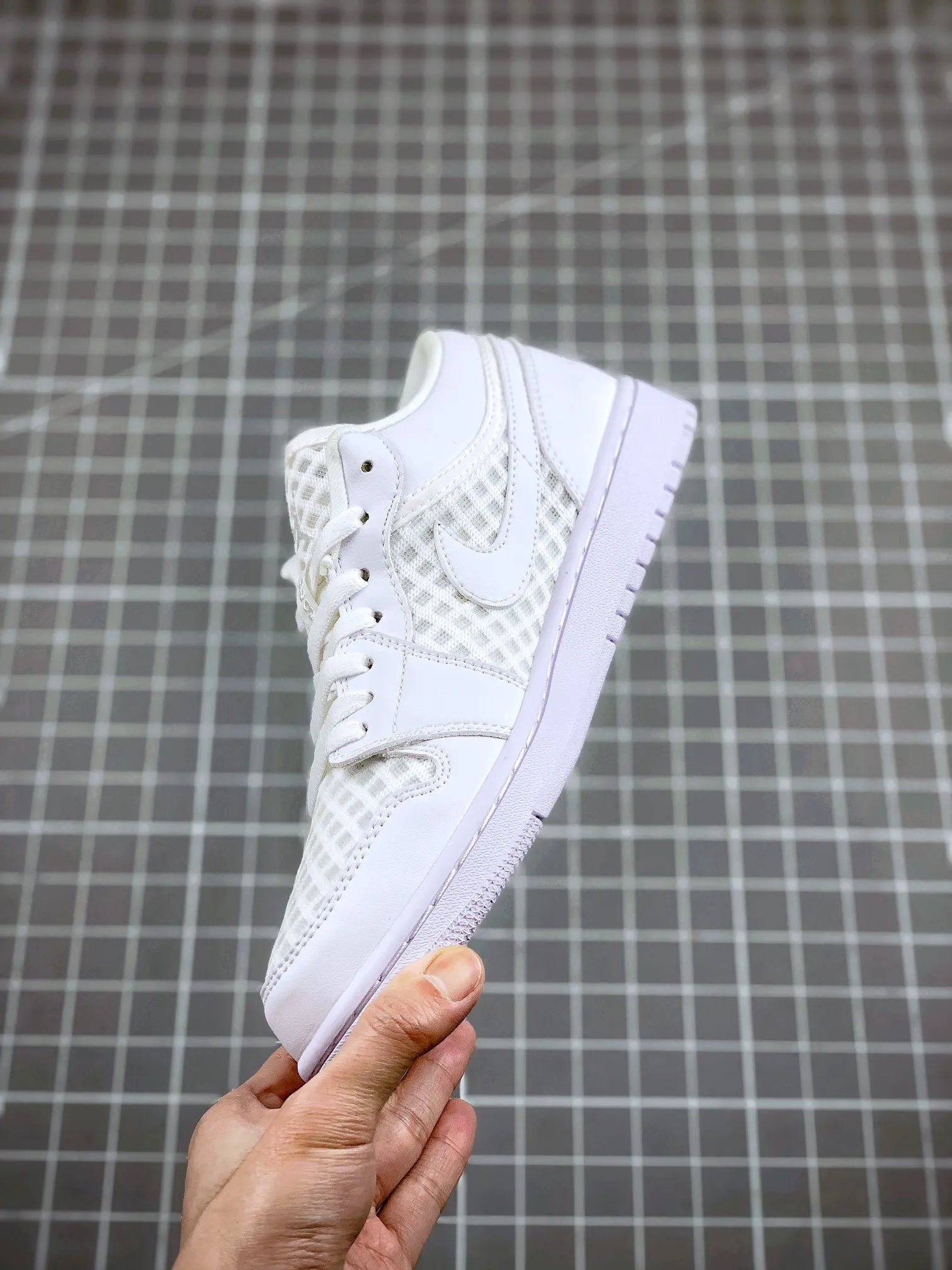 Air Jordan 1 Retro Low Breathe 'Triple White': A Comprehensive Review | YtaYta