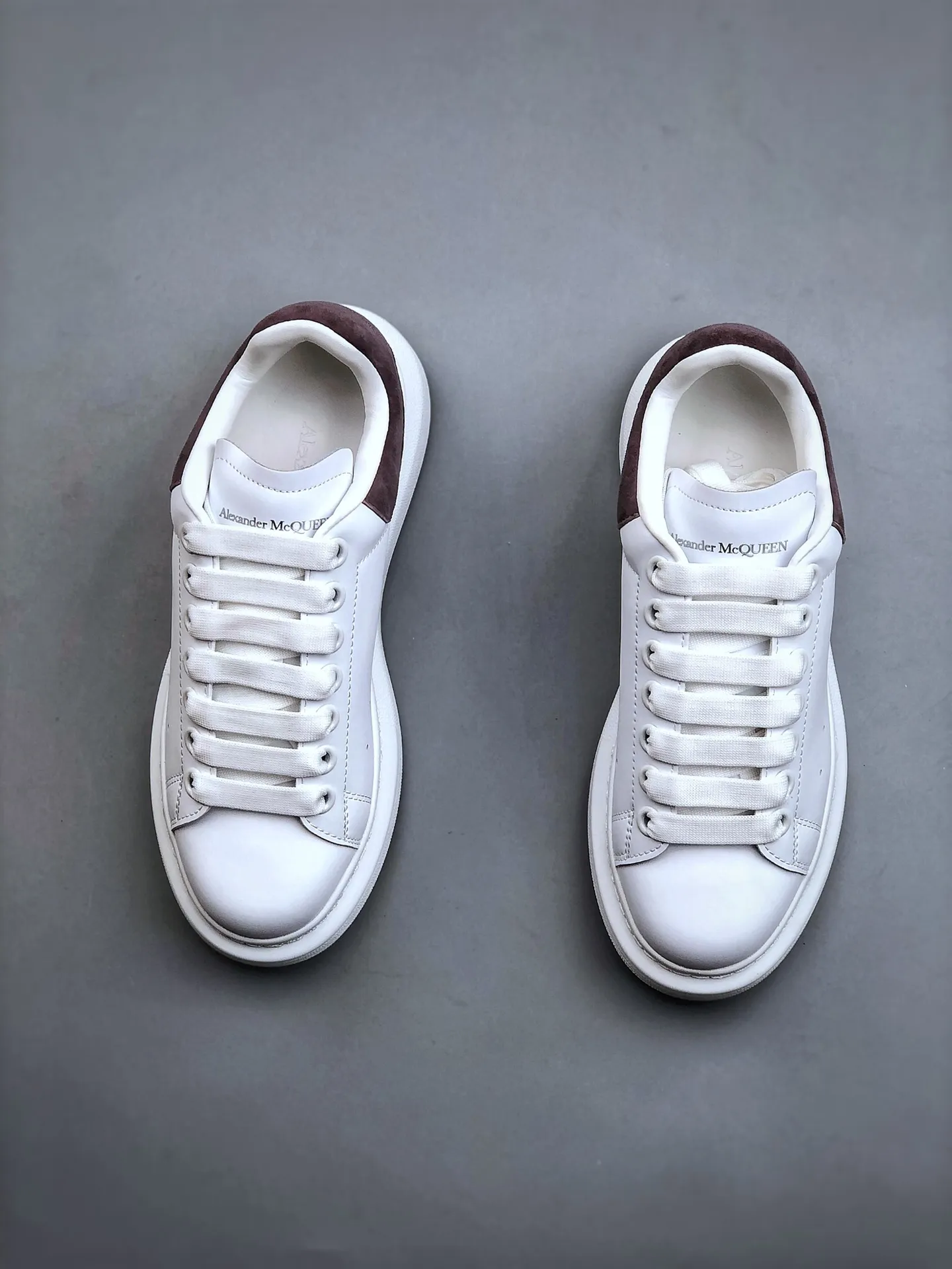 Replica Alexander McQueen White & Gunmetal Leather Exaggerated Sole Sneakers | YtaYta