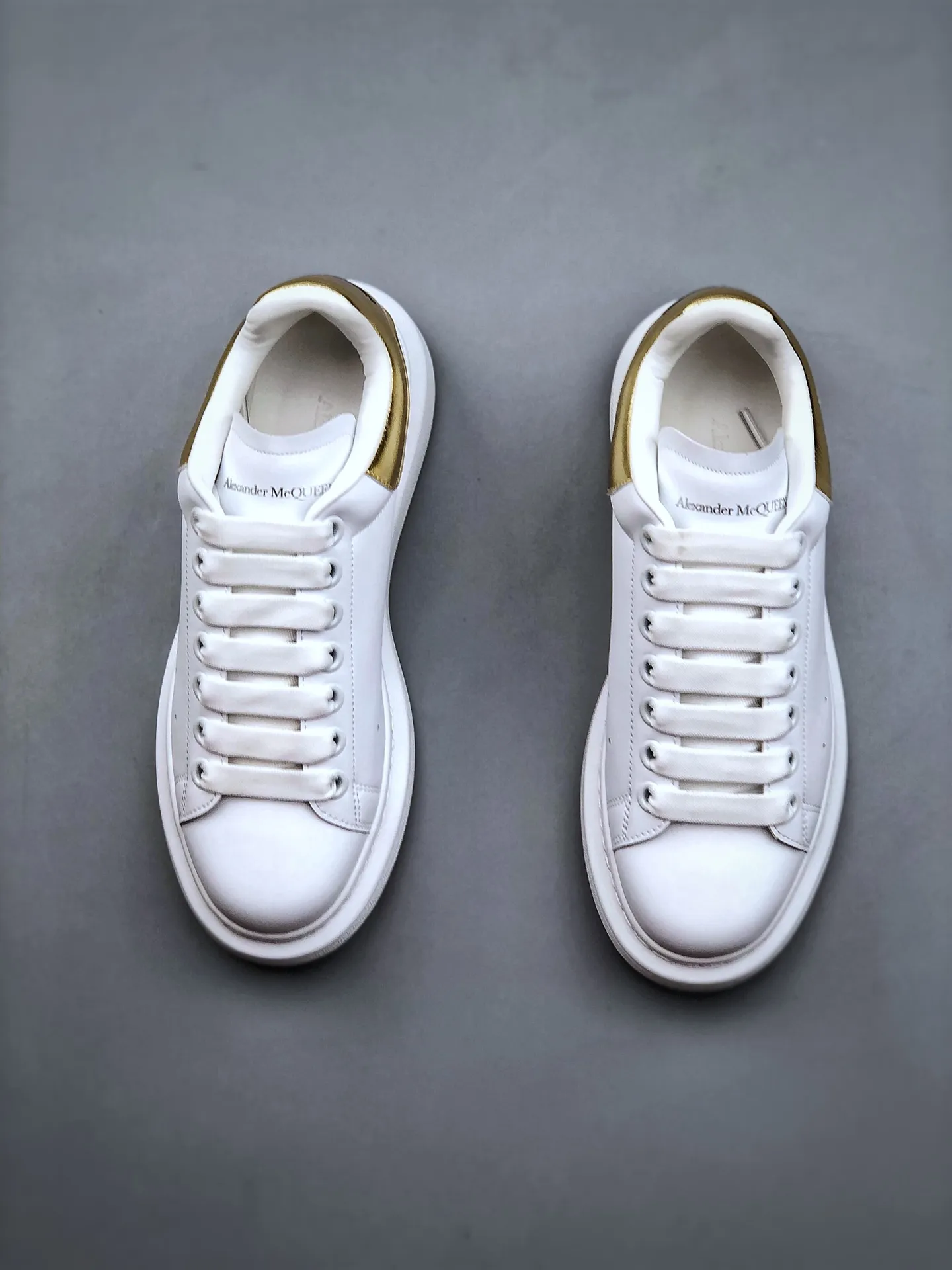 Alexander McQueen Replica Sneakers: A Comprehensive Guide to White and Gold Knockoffs | YtaYta