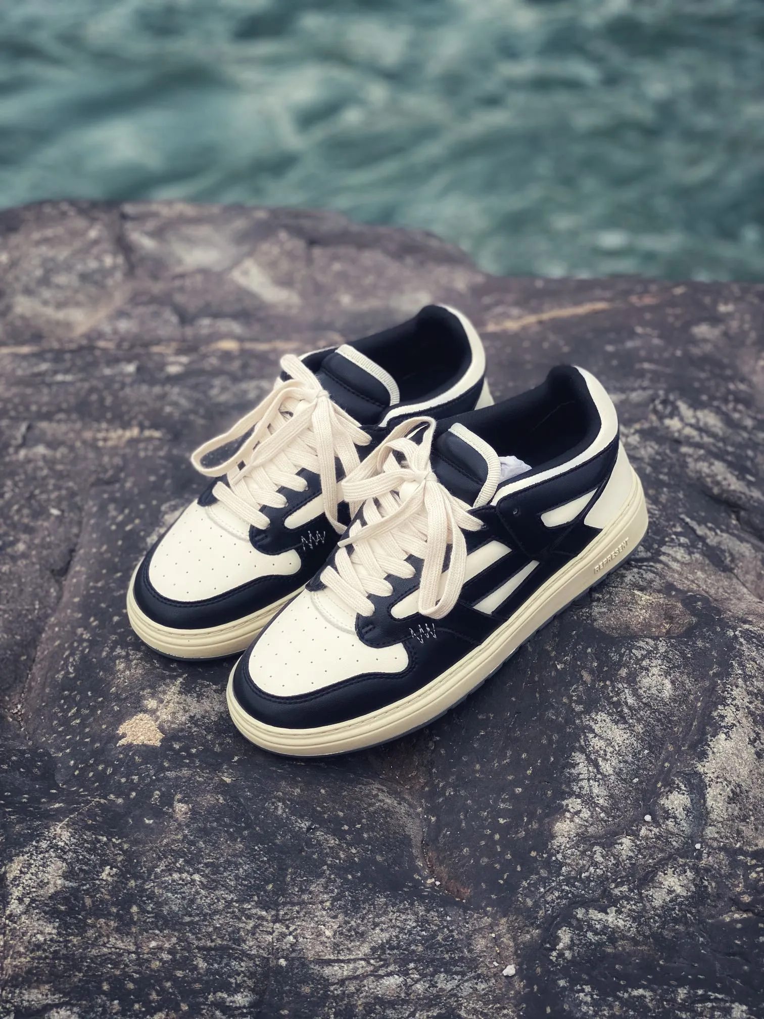 Replica Represent Reptor Low Sneakers: The Black and White Debate | YtaYta