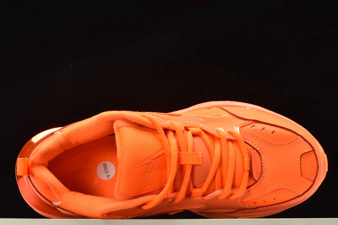 Nike M2K Tekno Orange Burst vs. Hyper Grape: A Comprehensive Comparison | YtaYta